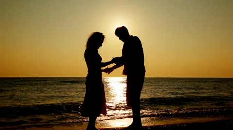 Boy And Girl Standing On Beach Silhouet Stock Video Pond5