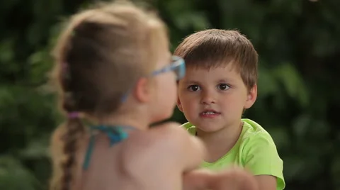 Boy and girl talk Stock-Footage 59104703