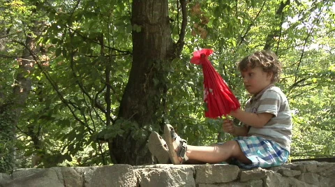 Boy and parasol Stock Footage 239969