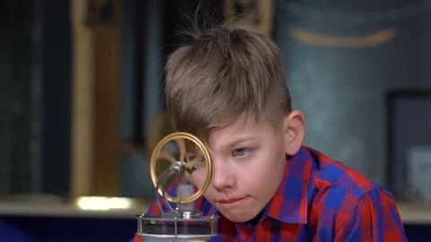 The boy and the Stirling engine Stock-Footage 73049887