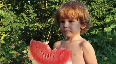Boy and Watermelon Stock Footage 8637630
