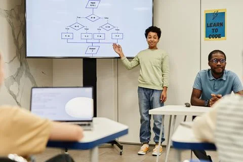 Boy Answering in Coding Class Stock Photos