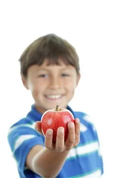 Boy with apple Stock Photos