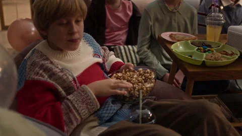 Boy Asking for Bowl of Popcorn during Film Party at Home Stock-Footage 327922028