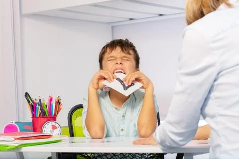 Boy with autism panic having difficulty learning 写真素材