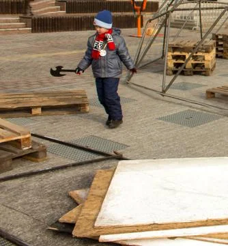 Boy with an ax Stock Photos