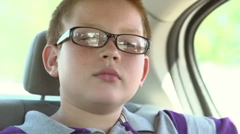 Boy in back of car for ride Stock Footage 12045170