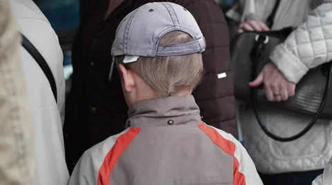 The Boy is Back in the Queue Stock Footage 63129514