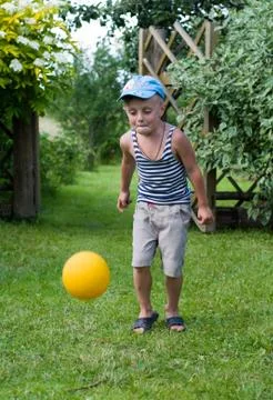 The boy with a ball. Stock Photos