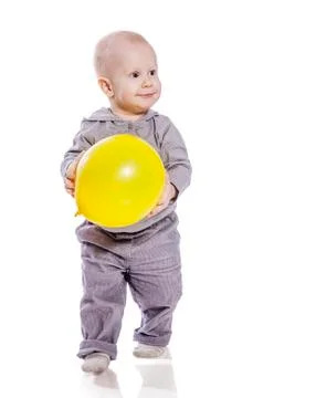 Boy with balloon Stock Photos