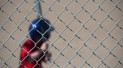 A boy is at bat while playing little league baseball. Stock Footage 68024142