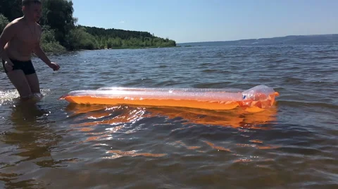 Boy bathes in the river Stock Footage 66345645