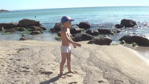 Boy on beach Stock Footage 71123527