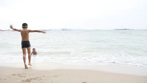 Boy on the beach Stock Footage 71235207
