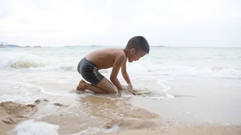 Boy on the beach Stock-Footage 71235238