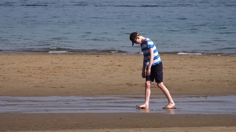 Boy on beach Stock Footage 91283694