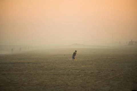 Boy on Beach Stock Photos