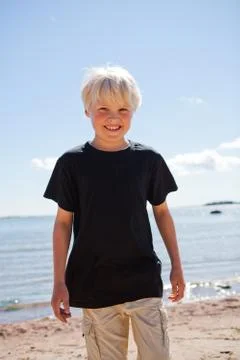 Boy on the beach Stock Photos