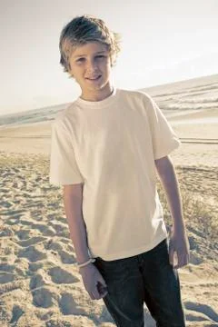 Boy on the beach Stock Photos