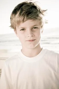 Boy on the beach Stock Photos