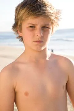 Boy on the beach Stock Photos