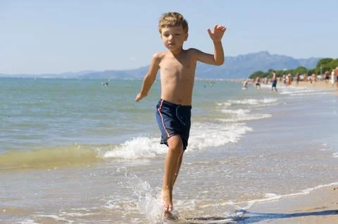 Boy on beach Foto stock