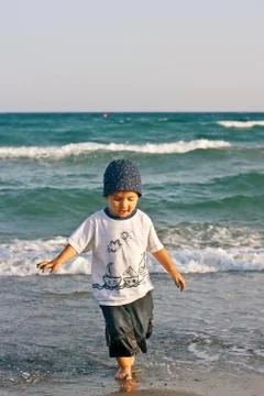 Boy on the beach Stock Photos