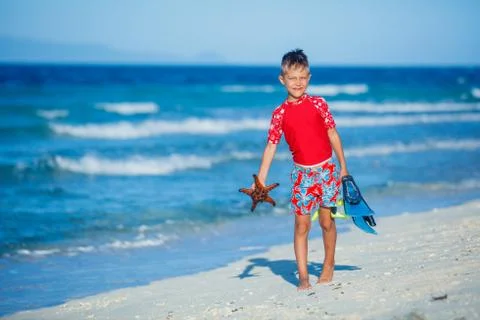 Boy on the beach 写真素材