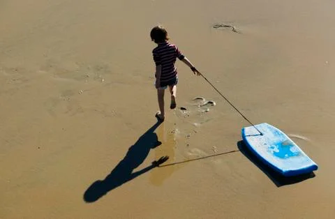 Boy on the Beach Stock Photos