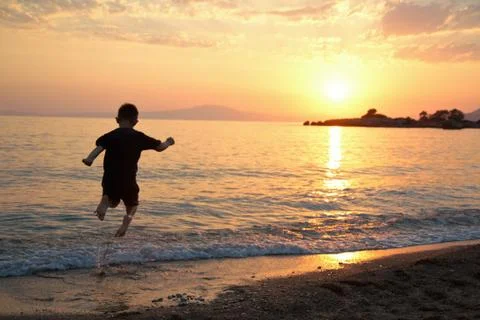 Boy on a beach Stock Photos