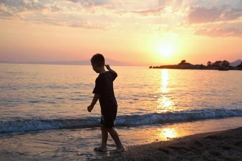 Boy on a beach Stock Photos