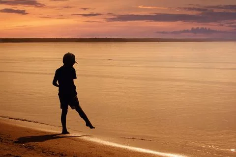 Boy on the beach Stock Photos