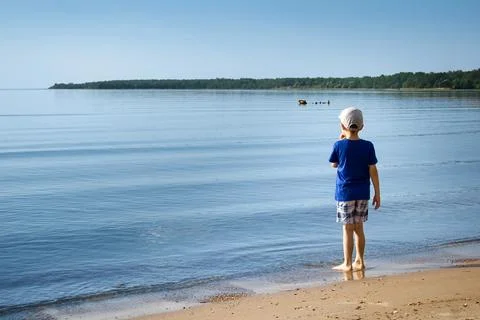 A boy on the beach Stock Photos