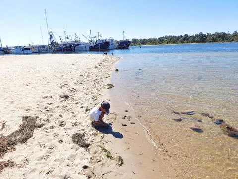 A boy at a beach Stock Photos