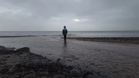 Boy at beach playing Stockbeeldmateriaal 145370582