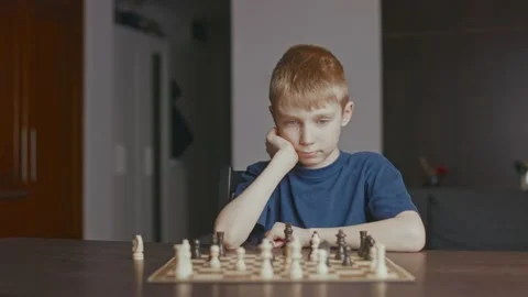 The boy beats figure in chess Stock Footage 233928301