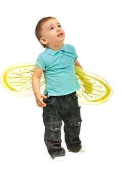 Boy with bee wings looking up Stock Photos