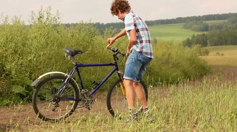 Boy With Bicycle Stock Footage 44456047
