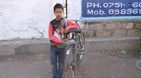Boy with bicycle Stock Footage 62528950