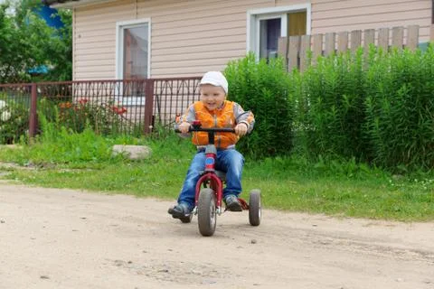 Boy on the bicycle Stock Photos
