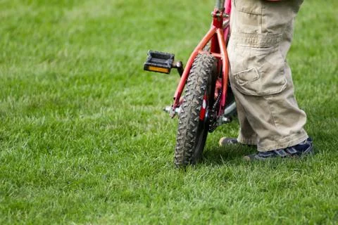 Boy with bicycle Stock Photos