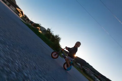 Boy on a bicycle. Stock Photos