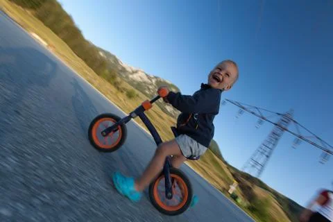 Boy on a bicycle. Stock Photos