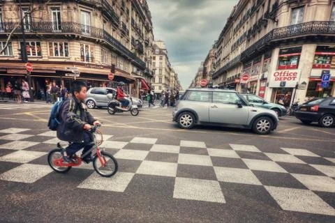 Boy on bicycle Stock Photos