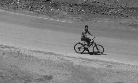 Boy in bicycle Stock Photos