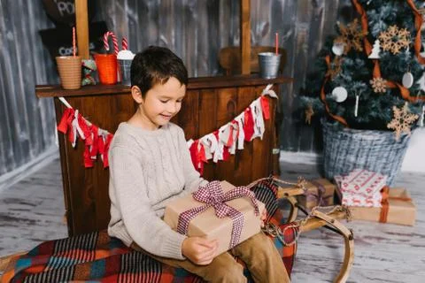Boy with big gift Stock Photos