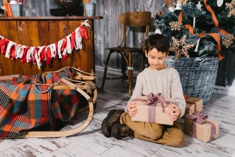 Boy with big gift Stock Photos