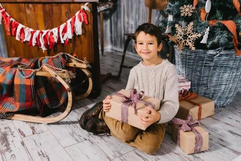 Boy with big gift Stock Photos