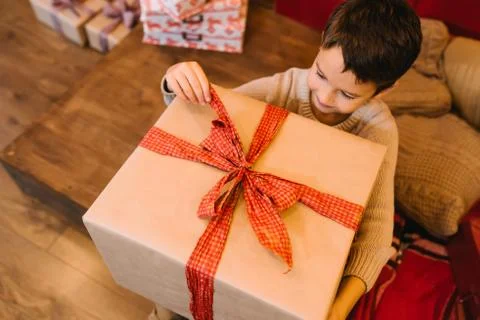 Boy with big gift Stock Photos