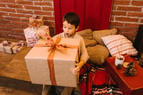 Boy with big gift Stock Photos